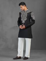 Black art silk kurta suit for a charming wedding look