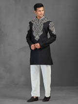 Black art silk kurta suit for a charming wedding look