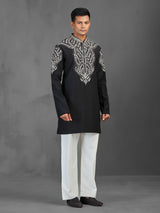 Black art silk kurta suit for a charming wedding look