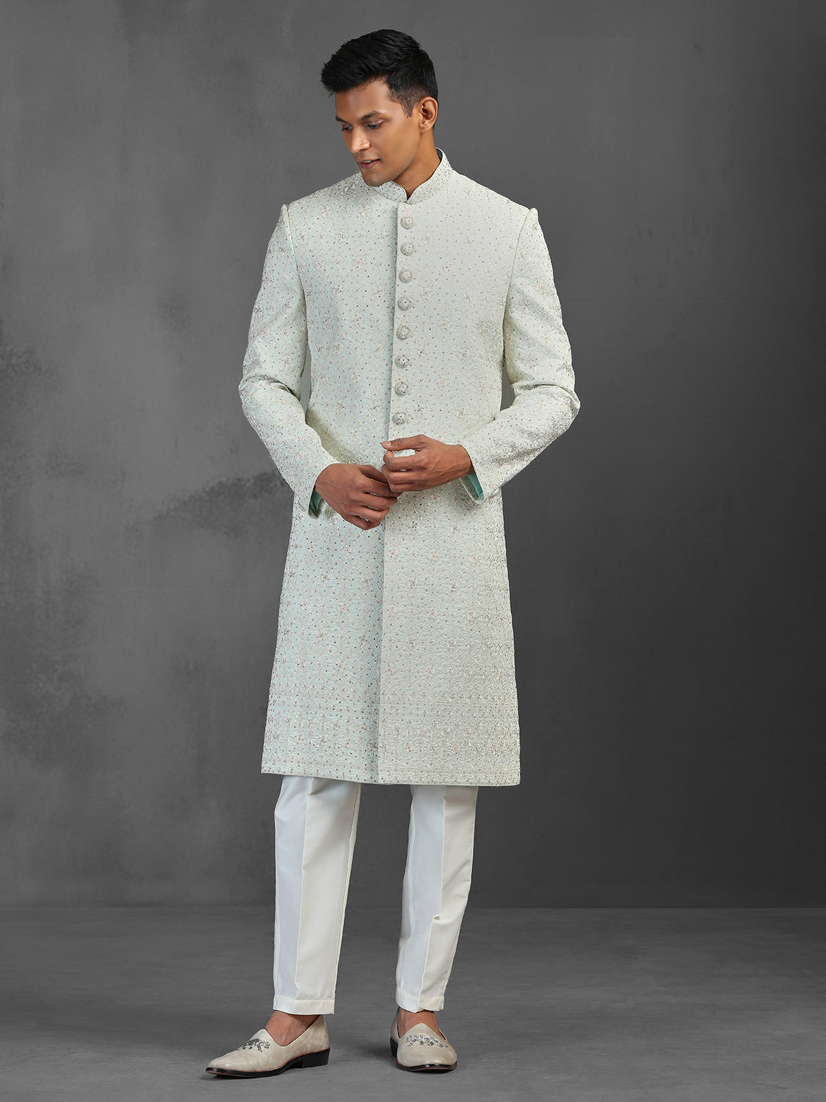 Light pista silk sherwani with thread and stone detailing