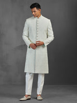 Light pista silk sherwani with thread and stone detailing