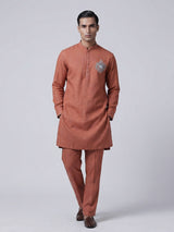 Dark peach linen kurta suit with brotch