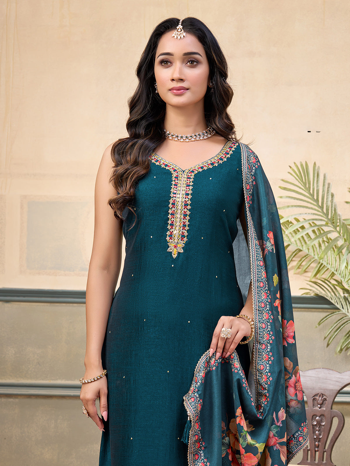 Peacock green silk embellished festive sleeveless straight salwar suit