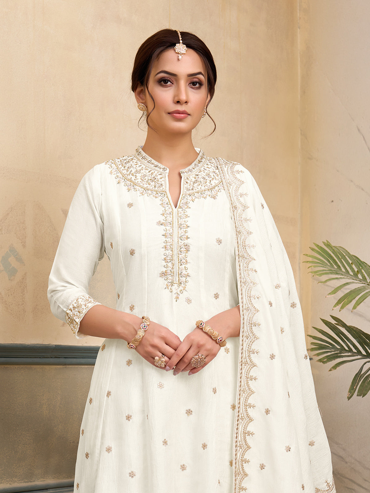 Off white silk anarkali embellished festive stand collar suit