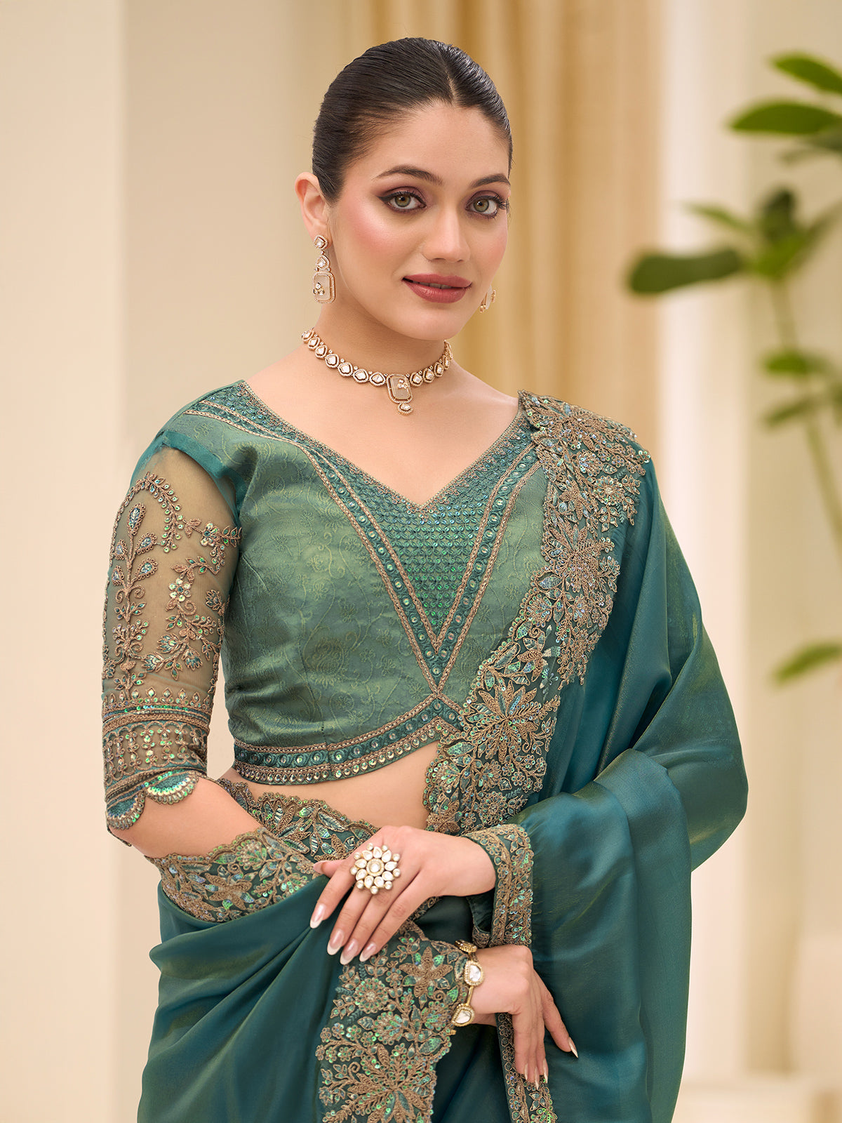 Rama green wedding tissue saree for festive celebration
