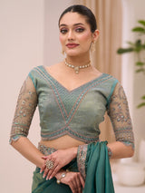 Rama green wedding tissue saree for festive celebration
