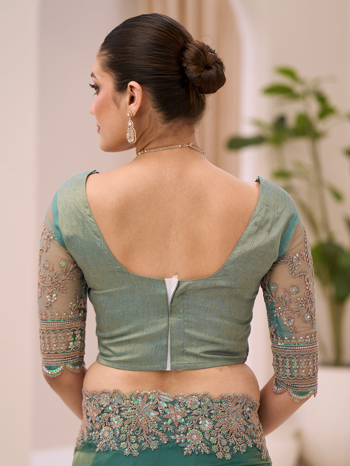 Rama green wedding tissue saree for festive celebration