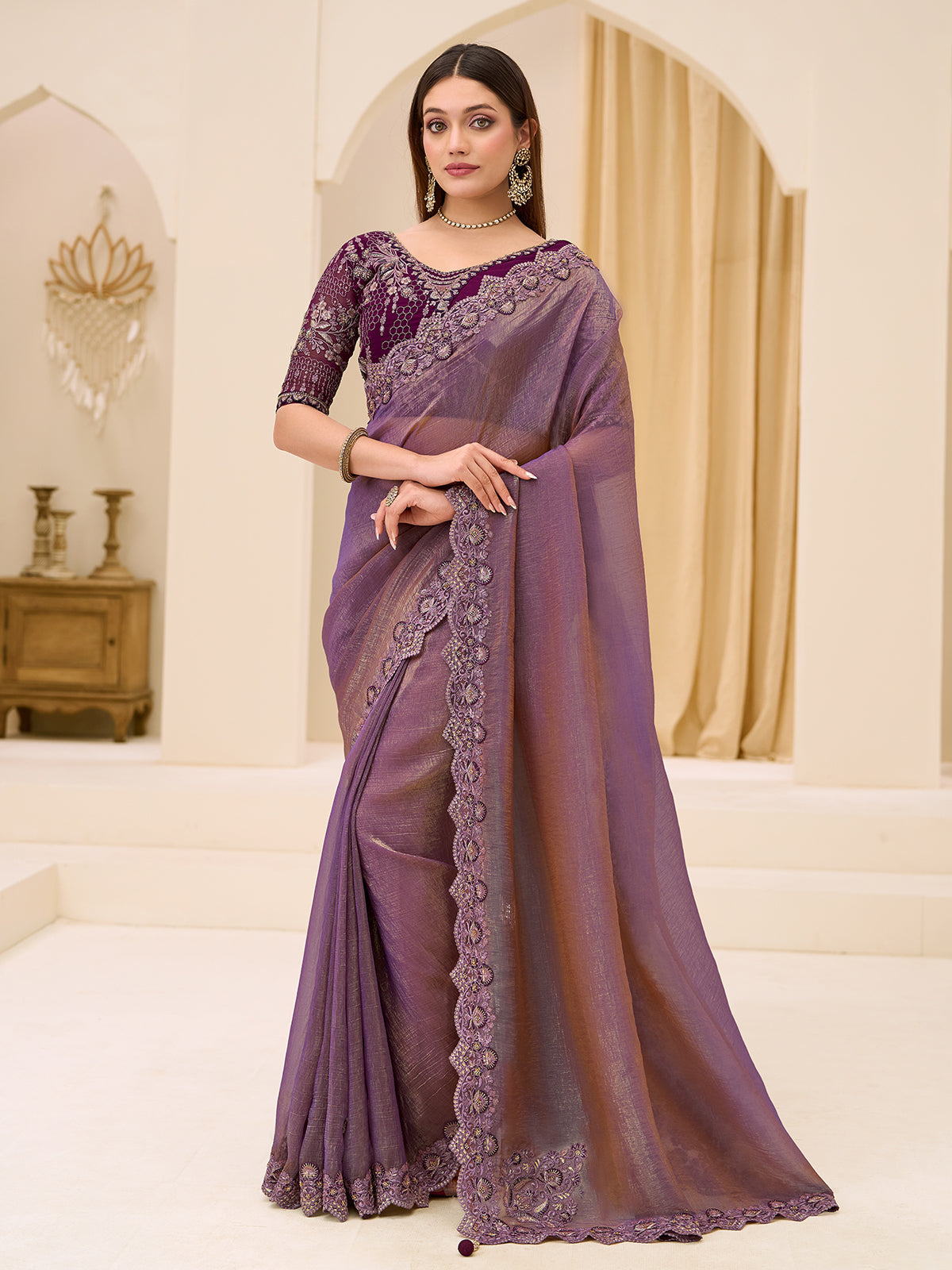 Purple georgette tissue saree with embellished border