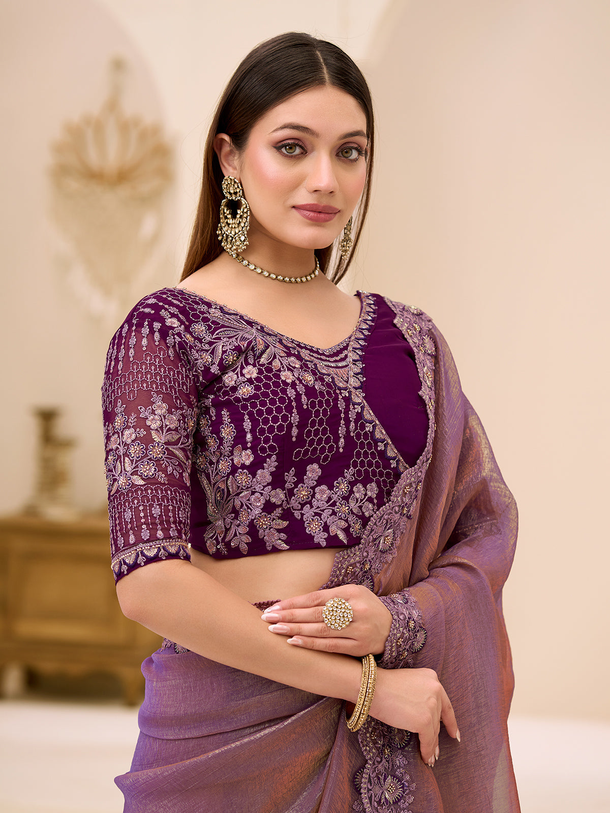 Purple georgette tissue saree with embellished border