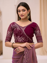 Purple georgette tissue saree with embellished border