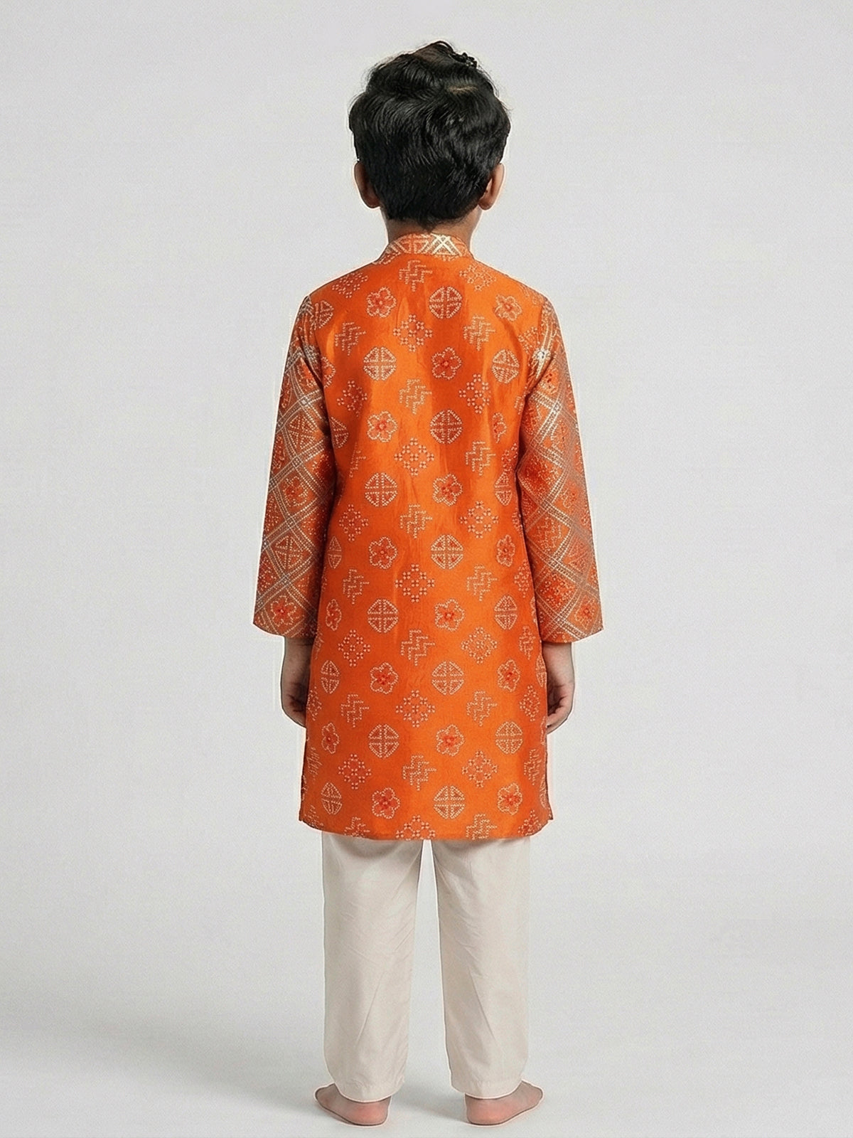 Orange bandhej printed zari work festive kurta suit