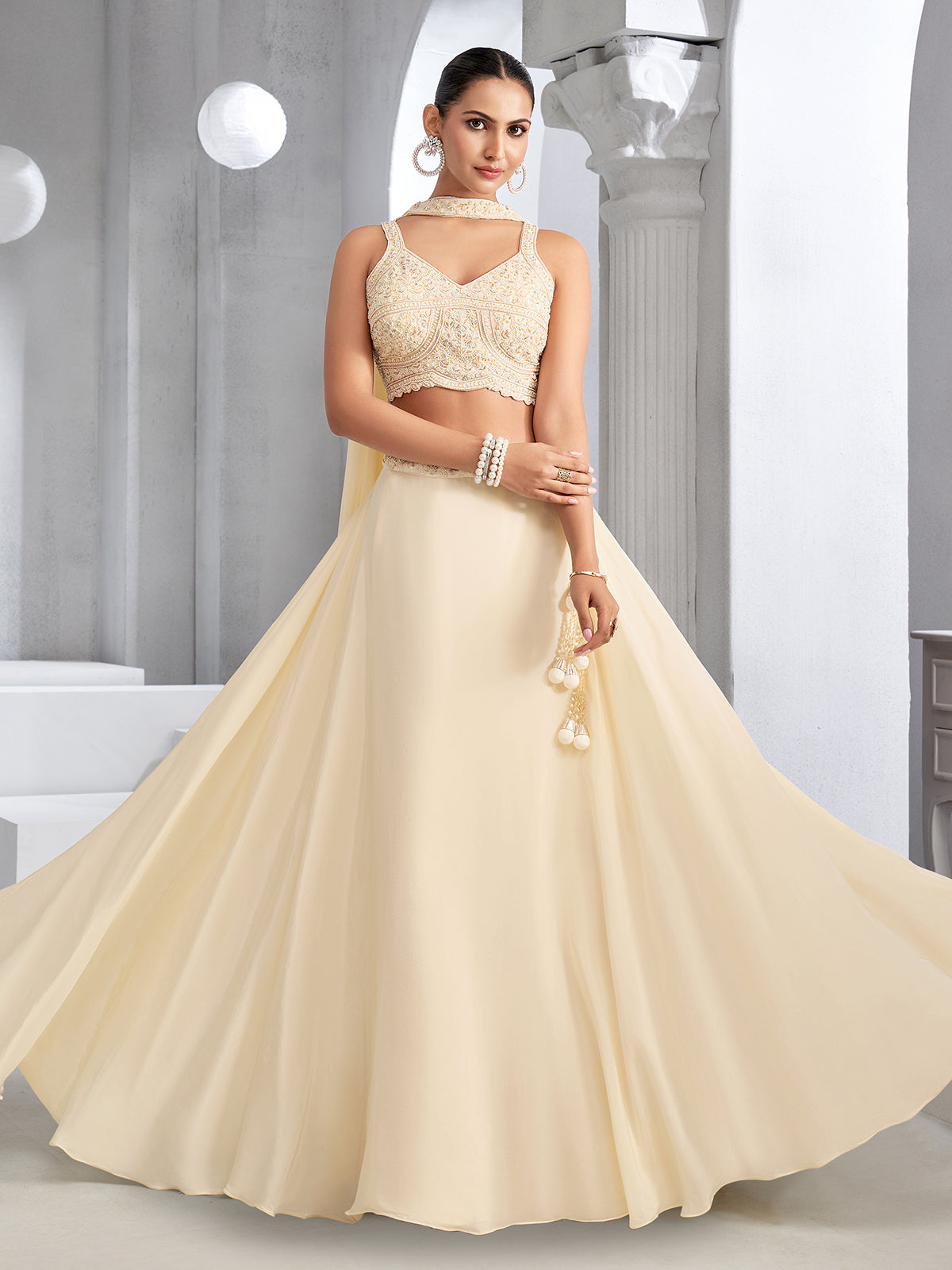 Beige reception wear crepe silk lehenga choli with choker dupatta