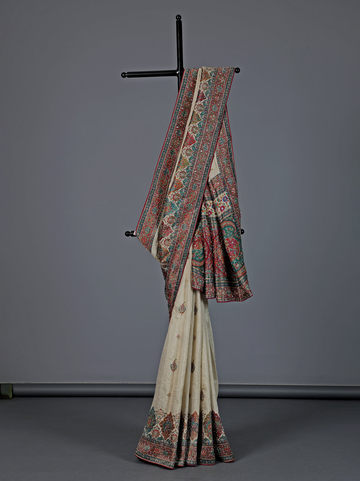 Cream silk colorful motif festive wear saree