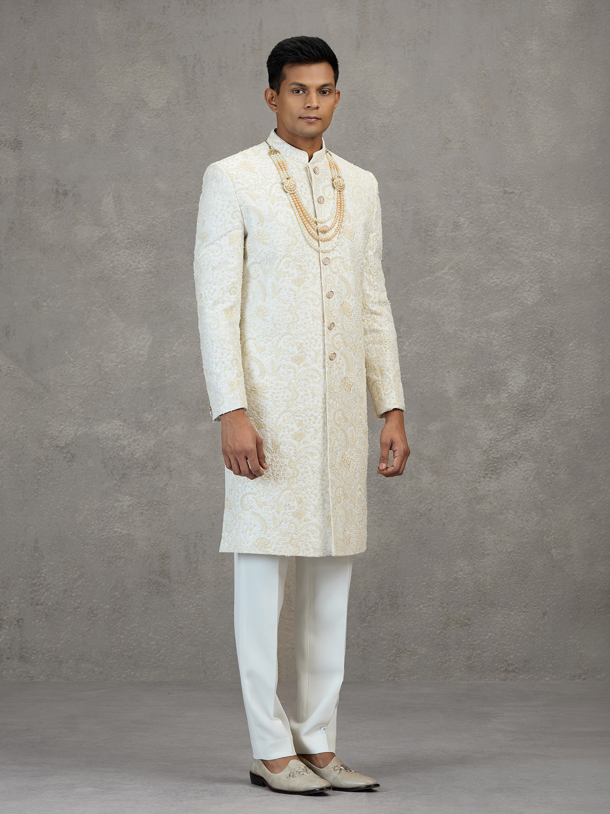 Off white satin silk sherwani with resham detailing
