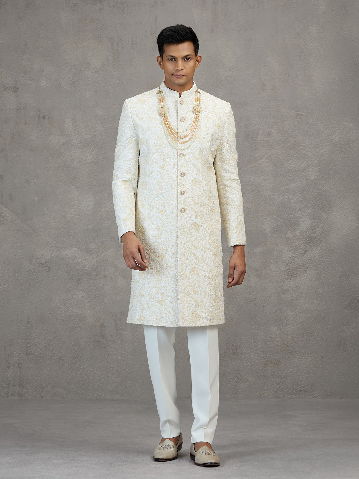 Off white satin silk sherwani with resham detailing
