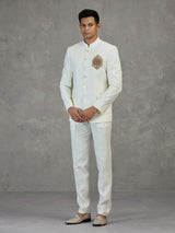 Ivory white wedding jodhpuri suit with metallic detailing