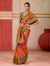 Orange silk saree with bold green border