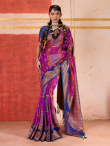 Violet silk saree with bold green and blue accents