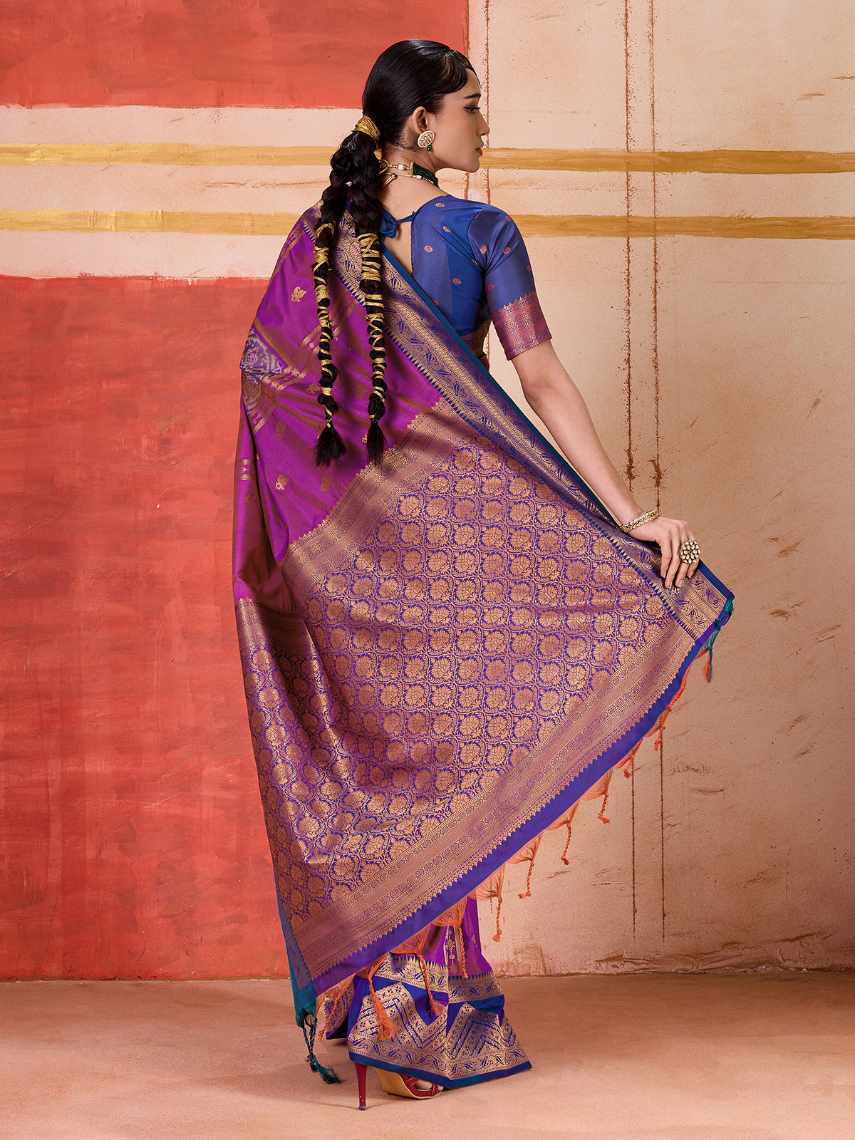 Violet silk saree with bold green and blue accents