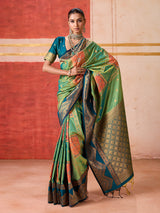 Green silk saree with highlighted contrasting border