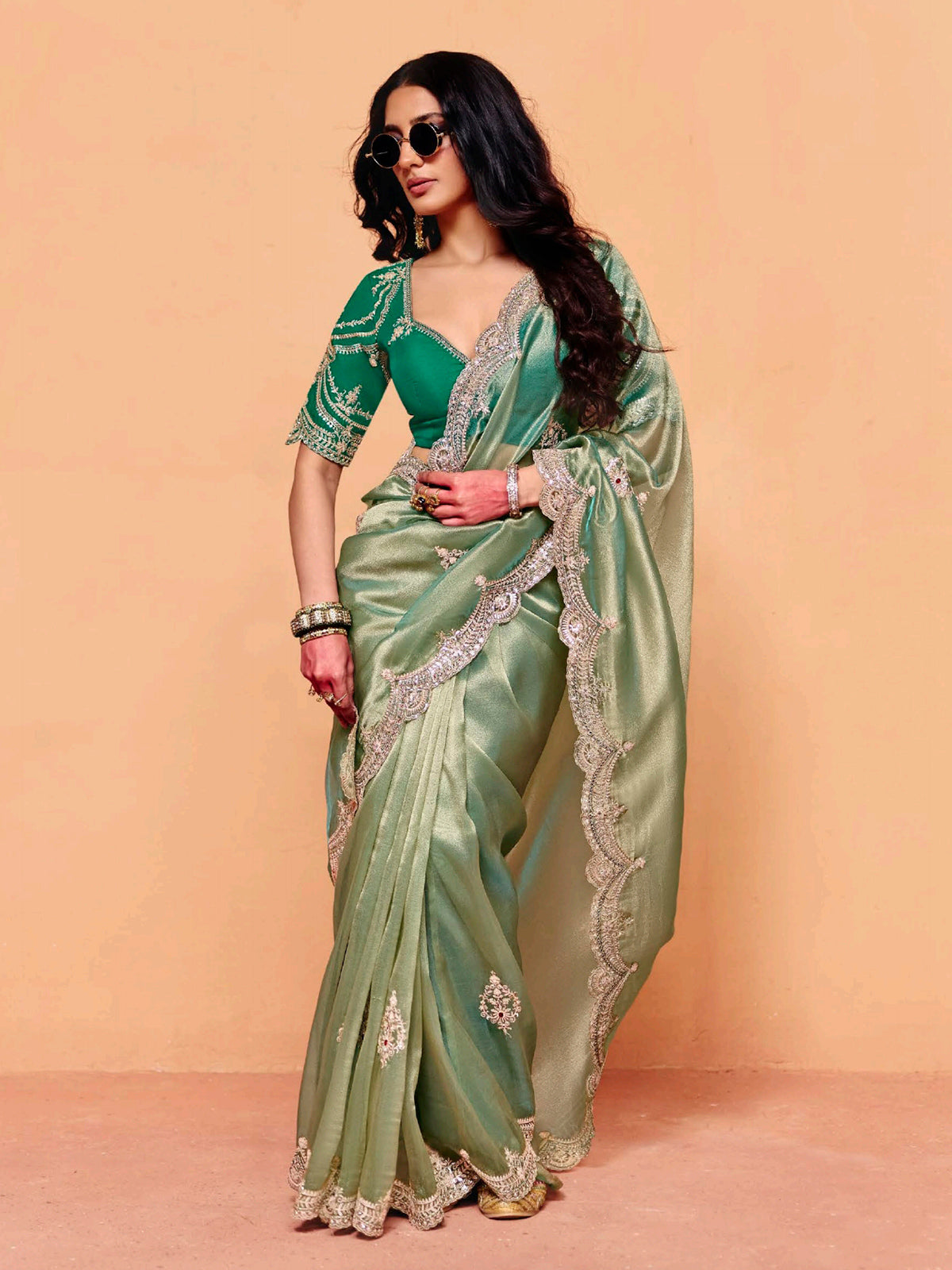 Pastel pista green tissue silk festive wear saree
