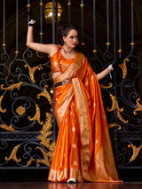 Vibrant orange satin crepe silk festive wear saree