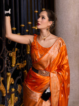 Vibrant orange satin crepe silk festive wear saree