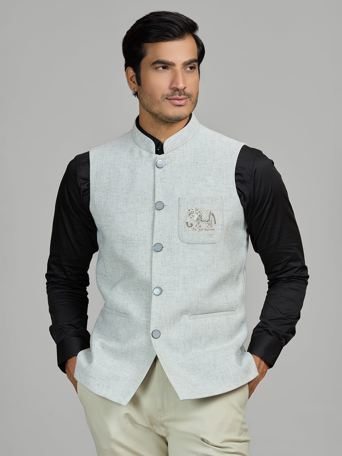 Mint blue linen wedding waistcoat with embellished pocket