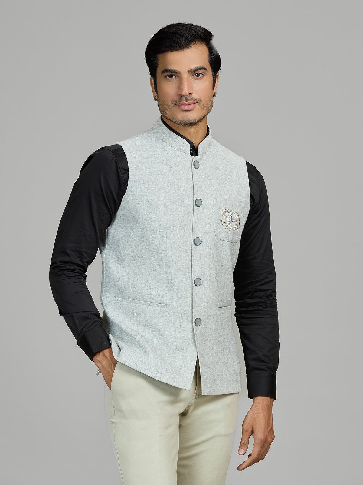 Mint blue linen wedding waistcoat with embellished pocket
