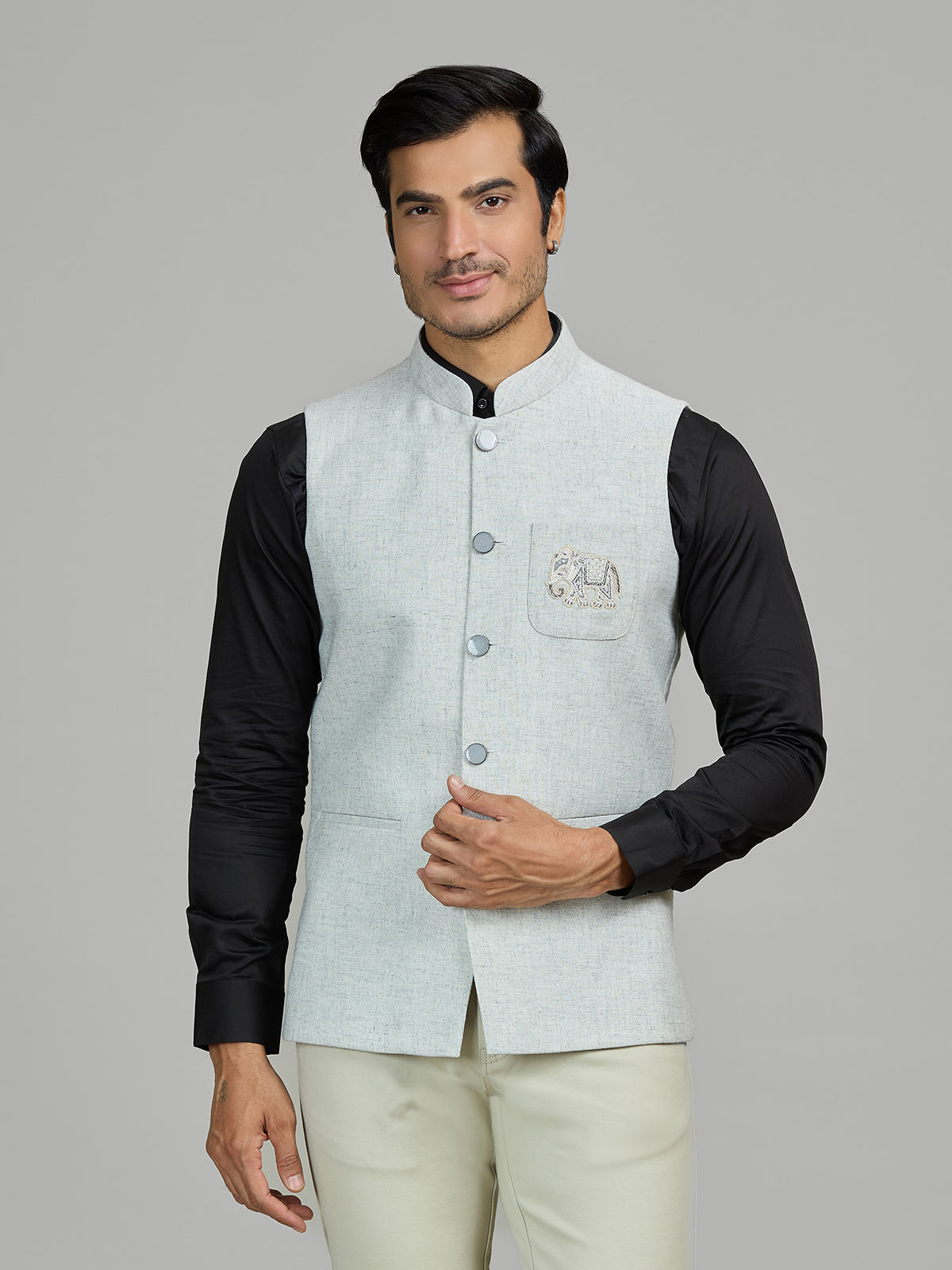 Mint blue linen wedding waistcoat with embellished pocket