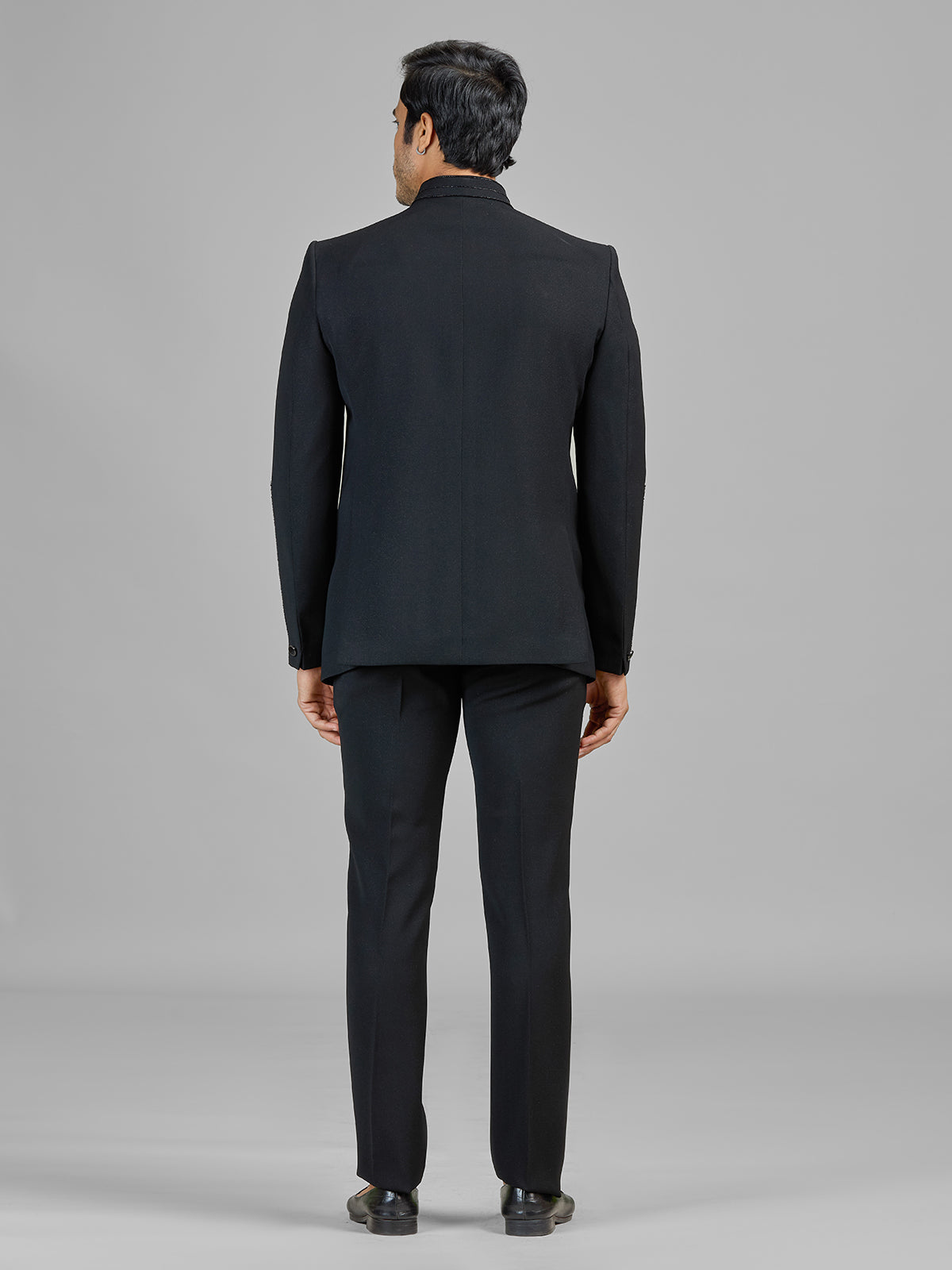 Black terry rayon jodhpuri suit embellished with cutdana