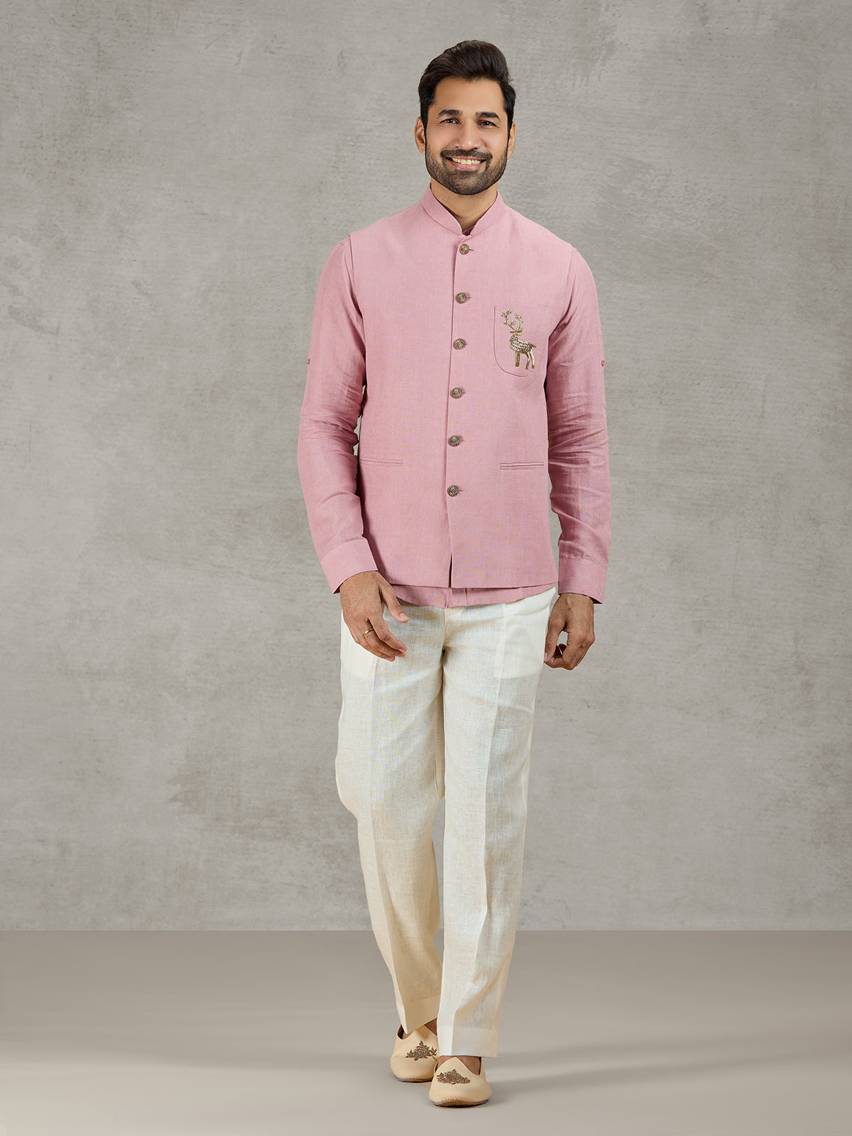 Pastel pink linen waistcoat set with embellished crest detail