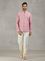 Pastel pink linen waistcoat set with embellished crest detail