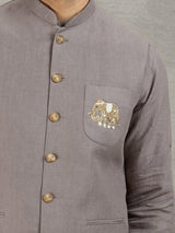 Grey linen waistcoat set with zardosi embellished crest