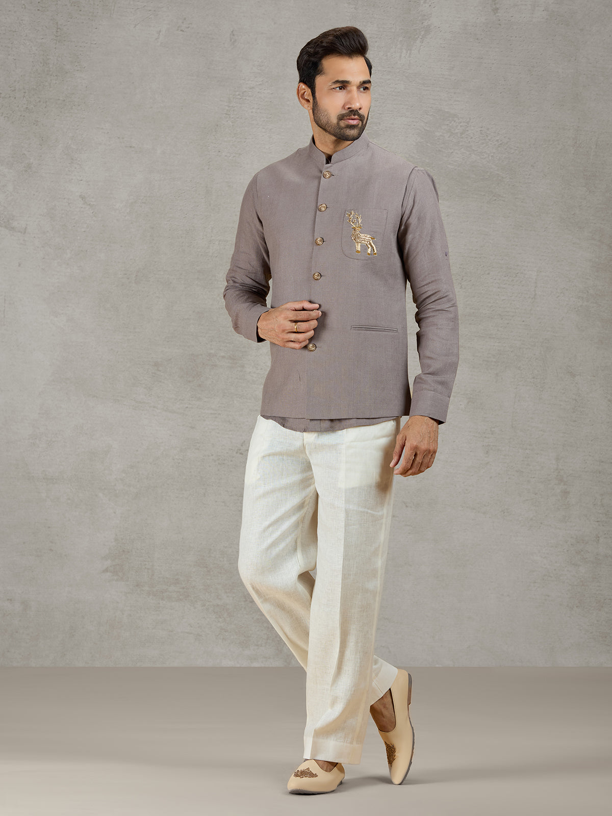 Grey linen waistcoat set with zardosi embellished crest