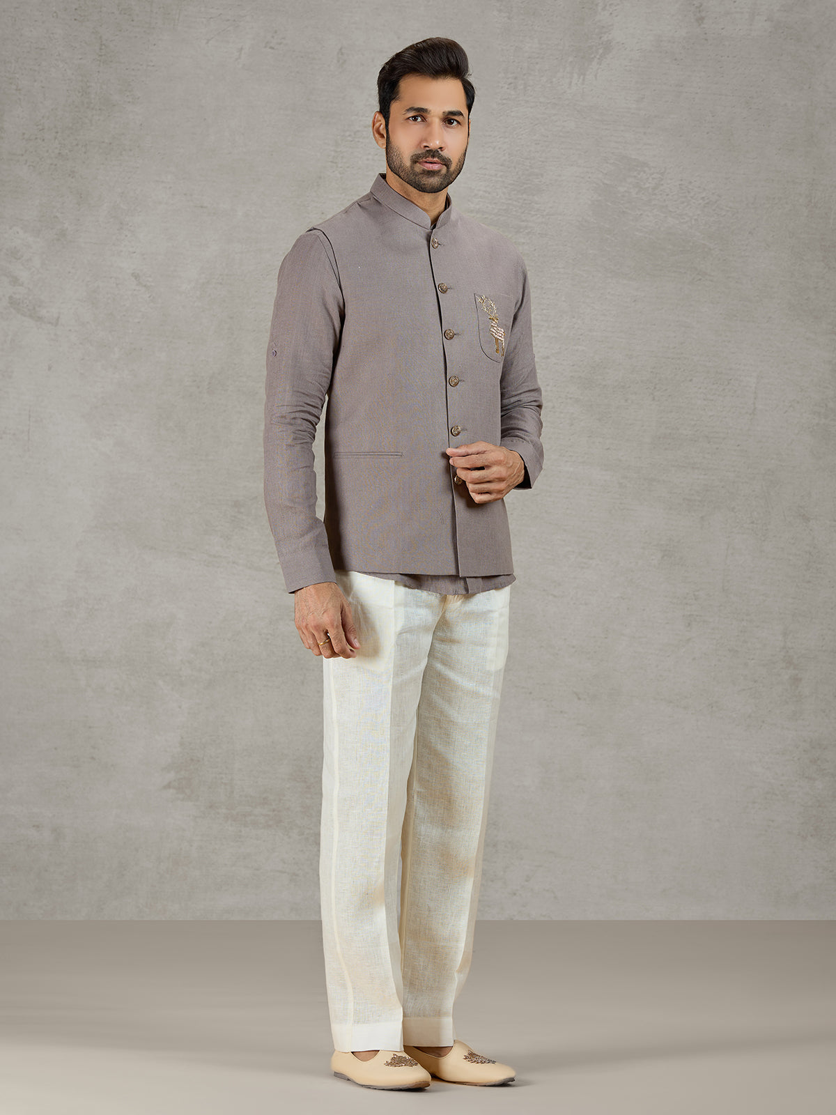 Grey linen waistcoat set with zardosi embellished crest