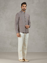 Grey linen waistcoat set with zardosi embellished crest