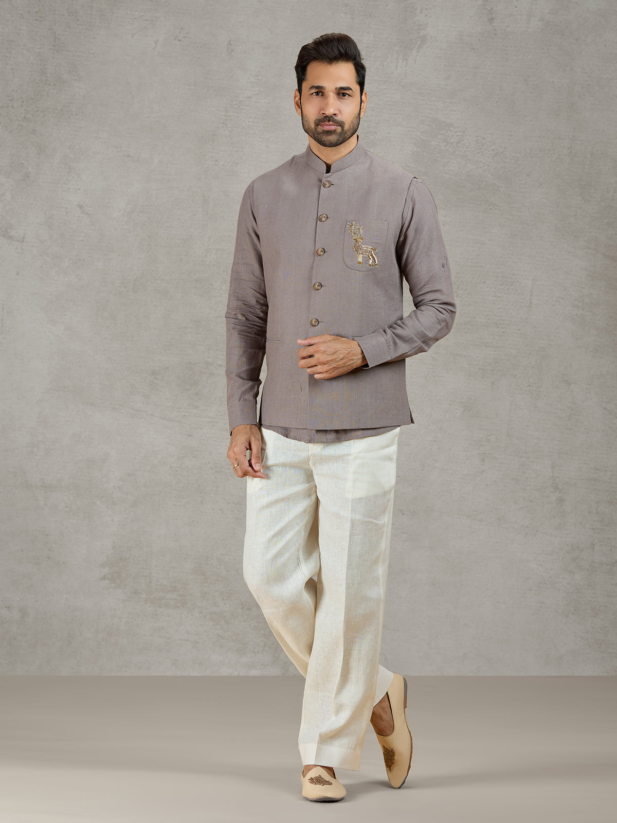 Grey linen waistcoat set with zardosi embellished crest
