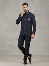 Navy linen waistcoat set with embroidered elephant crest
