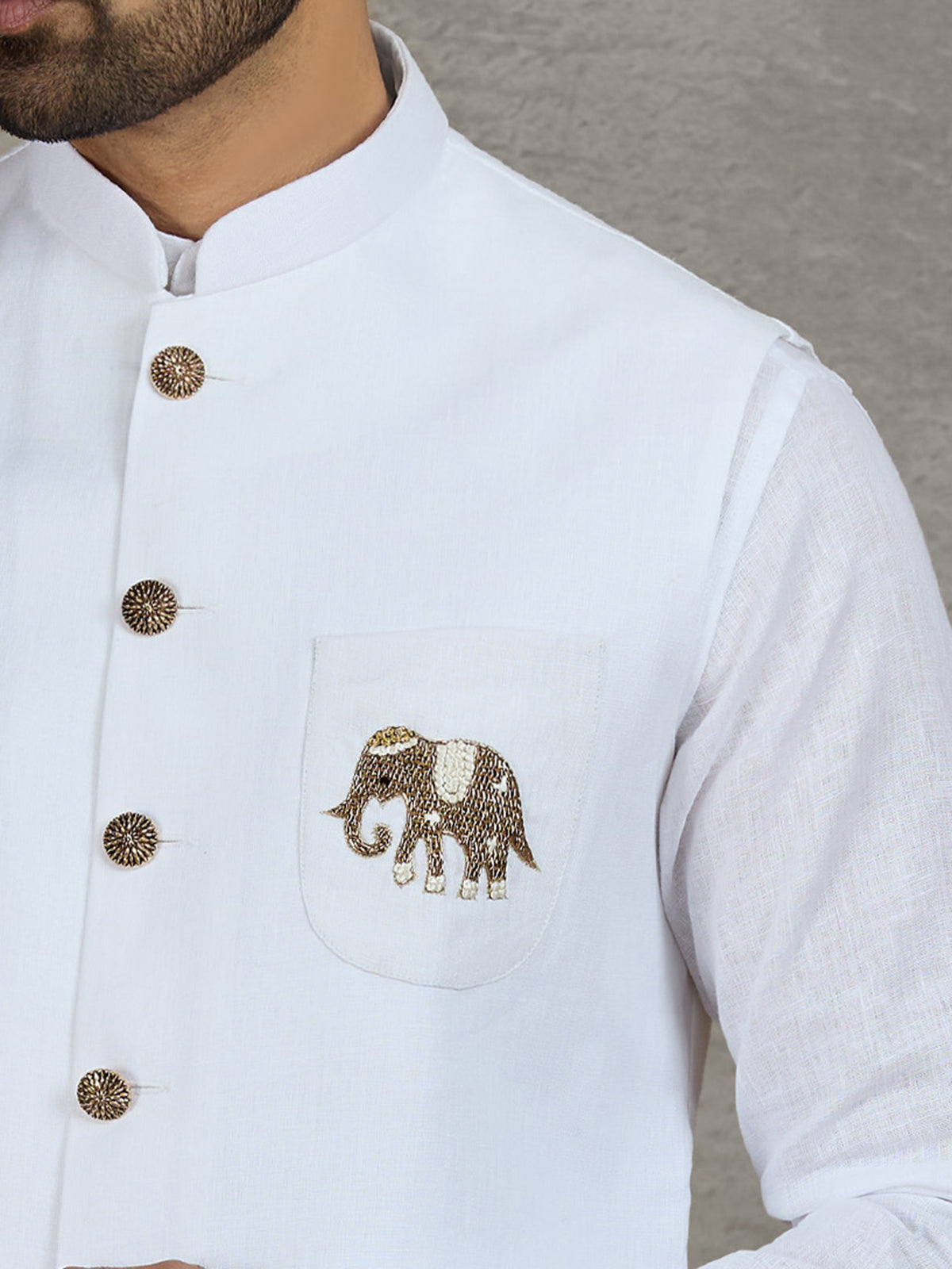 White linen waistcoat set with intricate zardosi work