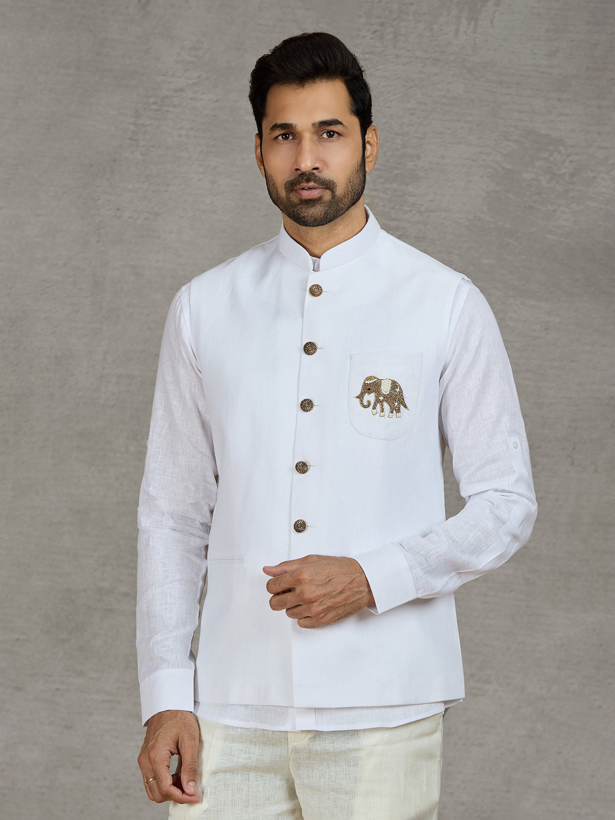White linen waistcoat set with intricate zardosi work