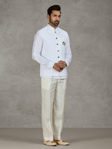 White linen waistcoat set with intricate zardosi work