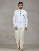 White linen waistcoat set with intricate zardosi work