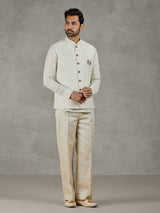 Beige linen festive wear waistcoat set with elegant detailing