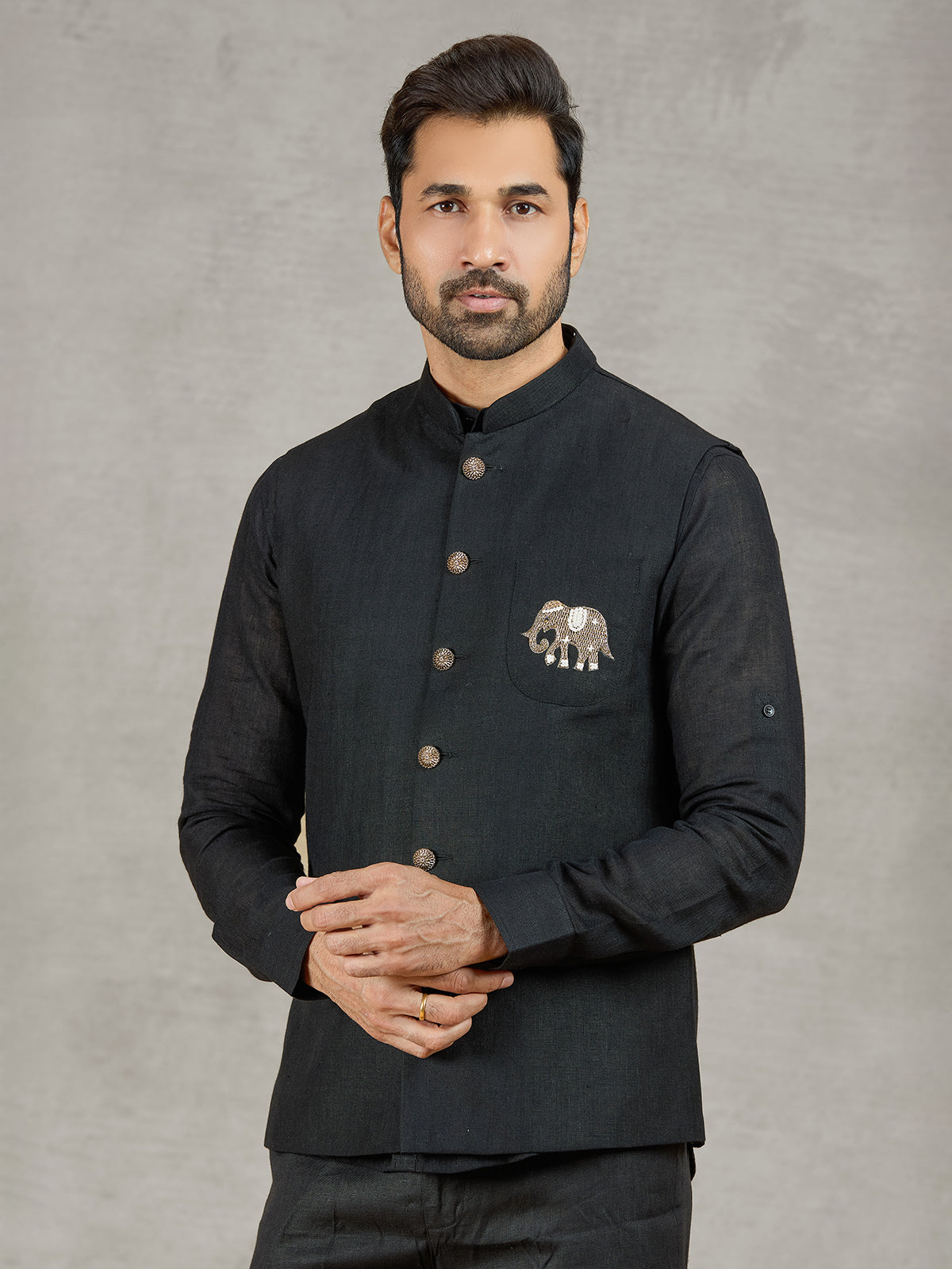 Black party wear linen waistcoat set with embellished crest