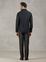 Black party wear linen waistcoat set with embellished crest