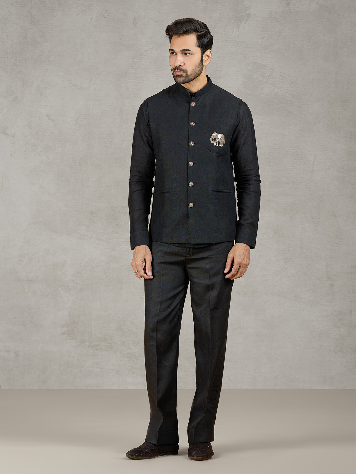 Black party wear linen waistcoat set with embellished crest