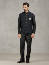 Black party wear linen waistcoat set with embellished crest