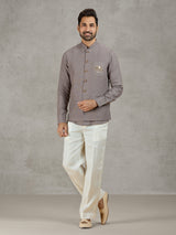 Grey linen waistcoat set with thread and zardosi work