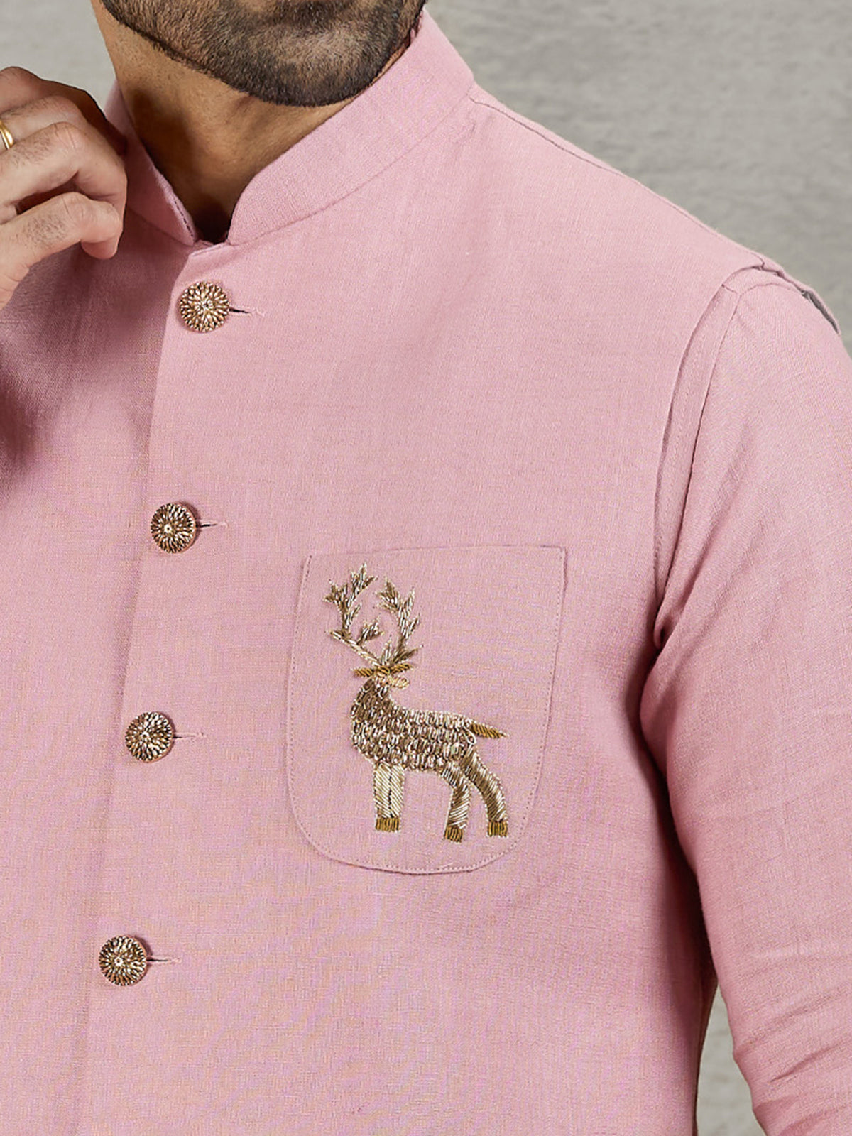 Pastel pink linen waistcoat with shirt and embellished crest detail